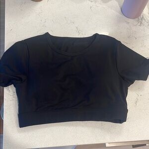 Open back black workout top NVGTN